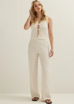 Singlet met striksluiting