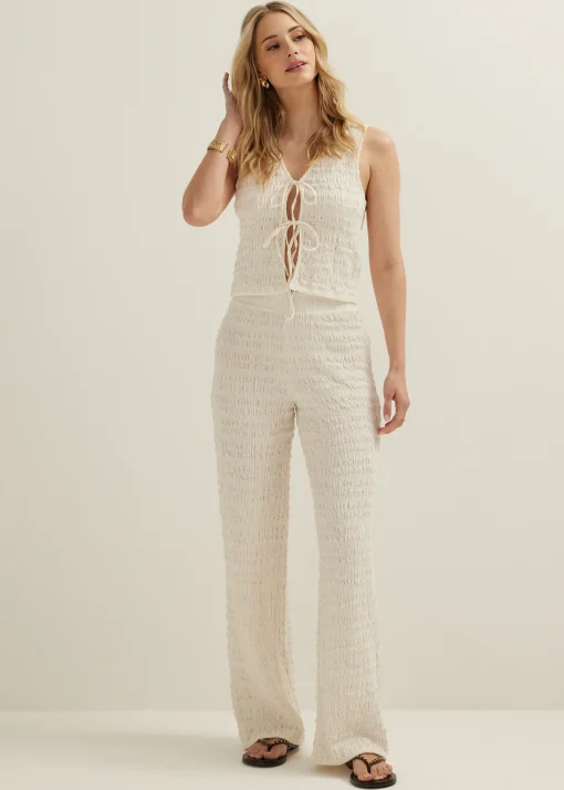 Singlet met striksluiting