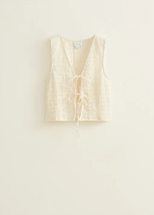 Singlet met striksluiting